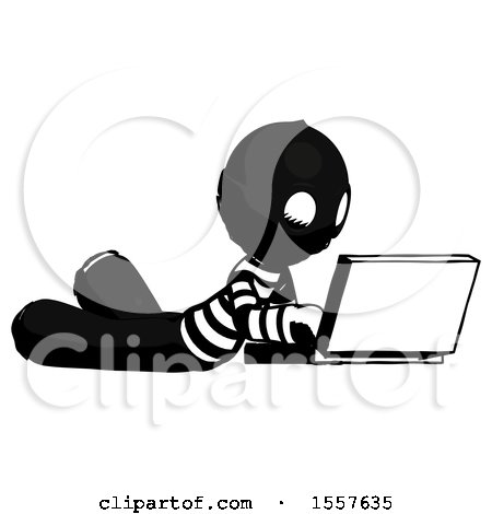 Ink Thief Man Using Laptop Computer While Lying on Floor Side Angled View by Leo Blanchette