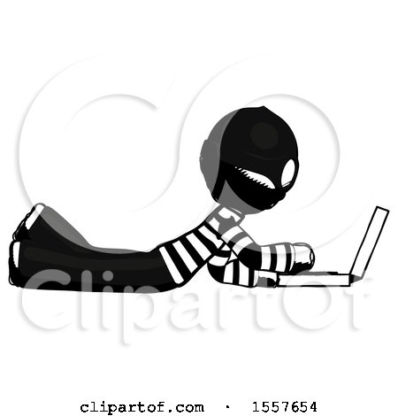 Ink Thief Man Using Laptop Computer While Lying on Floor Side View by Leo Blanchette