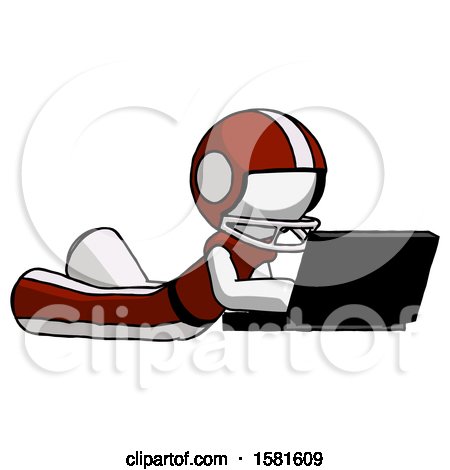 White Football Player Man Using Laptop Computer While Lying on Floor Side Angled View by Leo Blanchette
