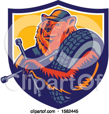 Clipart of a Retro Woodcut Bear Mechanic Holding a Tire Wrench and Tire in a Shield - Royalty Free Vector Illustration by patrimonio