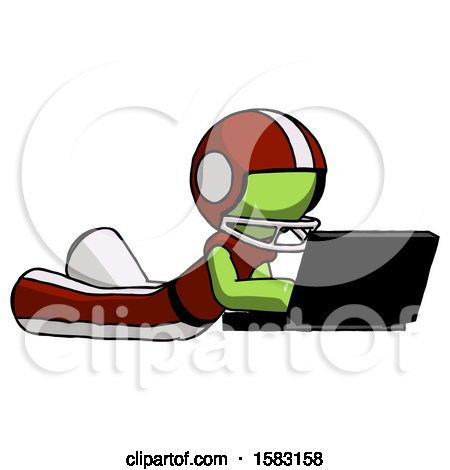 Green Football Player Man Using Laptop Computer While Lying on Floor Side Angled View by Leo Blanchette