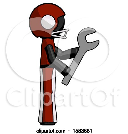Black Football Player Man Using Wrench Adjusting Something to Right by Leo Blanchette