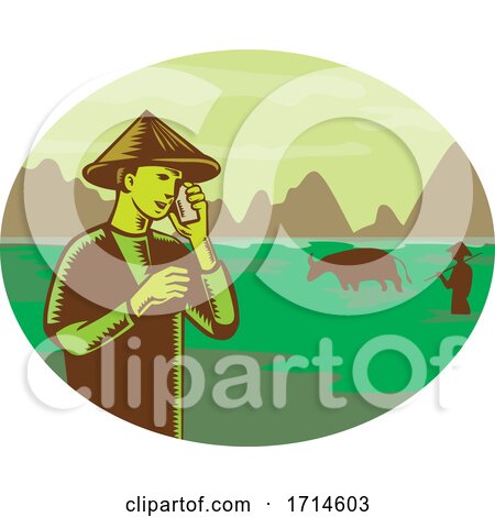 Vietnamese Farmer Wearing Conical Hat Talking on Mobile Phone by patrimonio