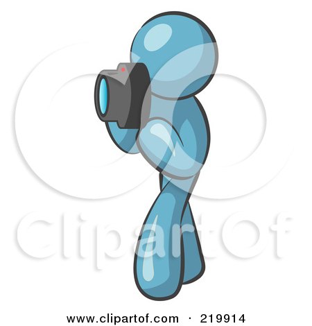 Royalty-Free (RF) Clipart Illustration of a Denim Blue Man Character Tourist Or Photographer Taking Pictures With A Camera by Leo Blanchette