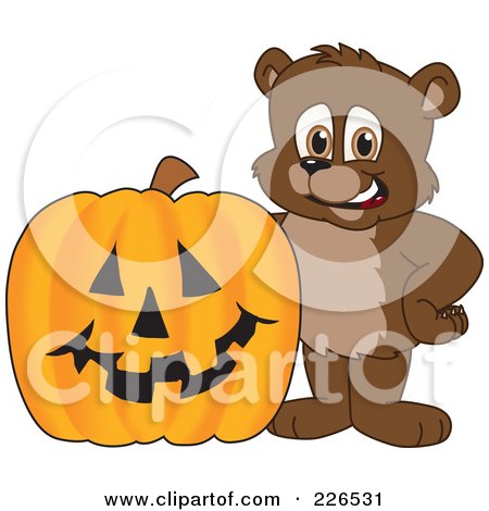 Royalty-Free (RF) Clipart Illustration of a Bear Cub School Mascot By A Halloween Pumpkin by Mascot Junction