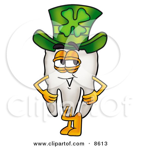 Clipart Picture of a Tooth Mascot Cartoon Character Wearing a Saint Patricks Day Hat With a Clover on it by Mascot Junction