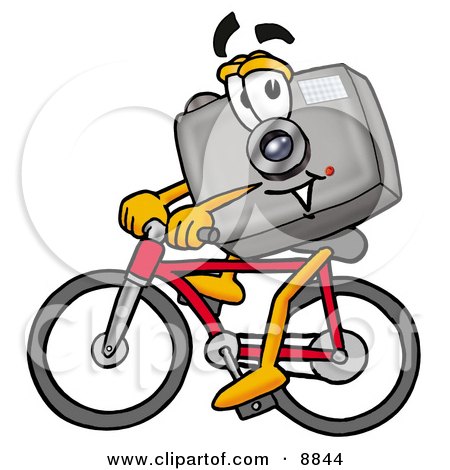 Clipart Picture of a Camera Mascot Cartoon Character Riding a Bicycle by Mascot Junction