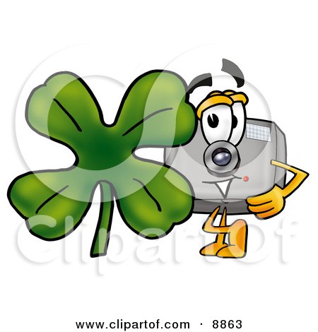 Clipart Picture of a Camera Mascot Cartoon Character With a Green Four Leaf Clover on St Paddy's or St Patricks Day by Mascot Junction
