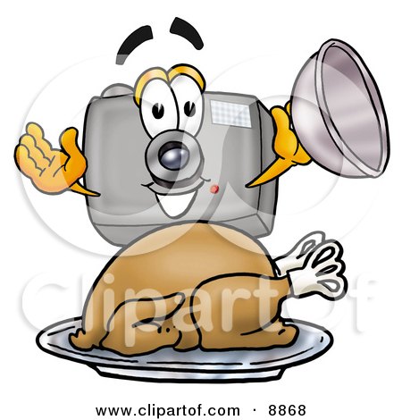 Clipart Picture of a Camera Mascot Cartoon Character Serving a Thanksgiving Turkey on a Platter by Mascot Junction