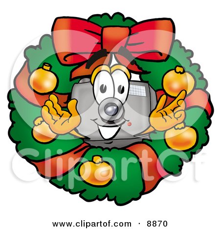 Clipart Picture of a Camera Mascot Cartoon Character in the Center of a Christmas Wreath by Mascot Junction