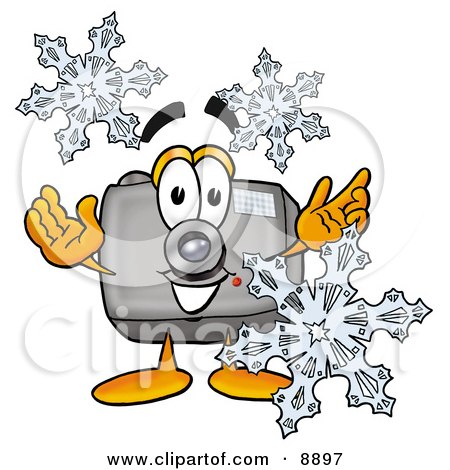 Clipart Picture of a Camera Mascot Cartoon Character With Three Snowflakes in Winter by Mascot Junction