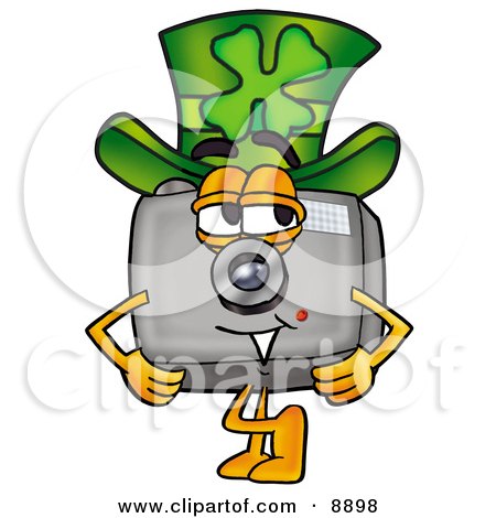 Clipart Picture of a Camera Mascot Cartoon Character Wearing a Saint Patricks Day Hat With a Clover on it by Mascot Junction
