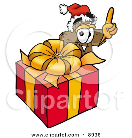 Clipart Picture of a Wooden Cross Mascot Cartoon Character Standing by a Christmas Present by Mascot Junction