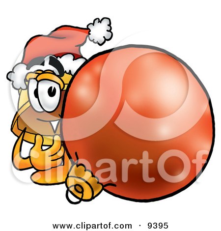 Clipart Picture of a Hard Hat Mascot Cartoon Character Wearing a Santa Hat, Standing With a Christmas Bauble by Mascot Junction