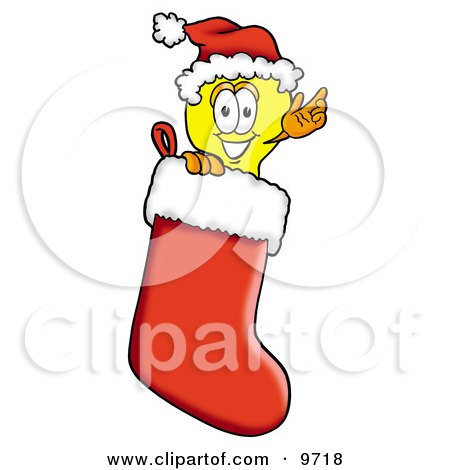 Clipart Picture of a Light Bulb Mascot Cartoon Character Wearing a Santa Hat Inside a Red Christmas Stocking by Mascot Junction