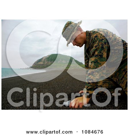 Soldier Collecting Sand From Iwo Jima - Free Stock Photography by JVPD
