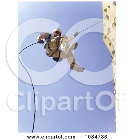 Soldier on a Rock Wall - Free Stock Photography by JVPD