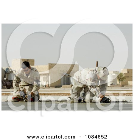 Soldiers Smoothing Cement - Free Stock Photography by JVPD