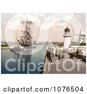 Steamboat Tugging A Ship Past The Pier And Windmill In Littlehampton Arun West Sussex England UK Royalty Free Stock Photography by JVPD