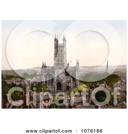 the Gloucester Cathedral and Steeple of Another Church Surrounded by Buildings in Gloucester England UK - Royalty Free Stock Photography  by JVPD