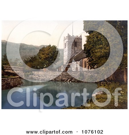 the St Oswald’s Church on the Waterfront in Grasmere Lake District Cumbria England UK - Royalty Free Stock Photography  by JVPD