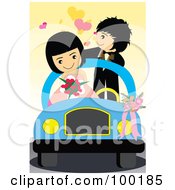 Cute Wedding Couple In Their Getaway Car