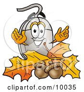 Computer Mouse Mascot Cartoon Character With Autumn Leaves And Acorns In The Fall