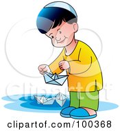 Poster, Art Print Of Little Boy Playing With Paper Boats