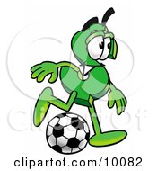 Dollar Sign Mascot Cartoon Character Kicking A Soccer Ball