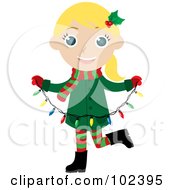 Blond Caucasian Christmas Girl Holding A Strand Of Christmas Lights
