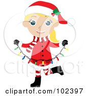 Blond Girl In A Christmas Suit Carrying Christmas Lights