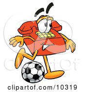 Red Telephone Mascot Cartoon Character Kicking A Soccer Ball
