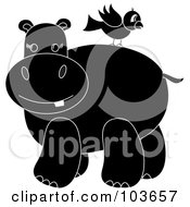 Poster, Art Print Of Silhouetted Bird On A Hippos Back