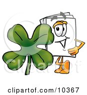 Paper Mascot Cartoon Character With A Green Four Leaf Clover On St Paddys Or St Patricks Day