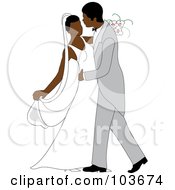 African American Newlywed Couple Dancing At Their Wedding