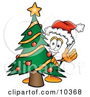 Paper Mascot Cartoon Character Waving And Standing By A Decorated Christmas Tree