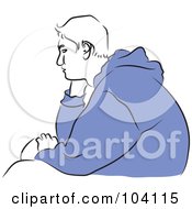 Bored Teen Boy In A Blue Sweater