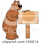 Poster, Art Print Of Tall Bear Pointing To A Blank Wood Sign