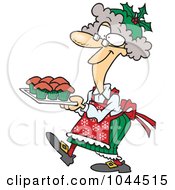 Royalty Free RF Clip Art Illustration Of A Cartoon Mrs Claus Baking Cupcakes by toonaday