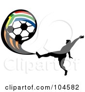 Silhouetted Soccer Player Kicking A South African Flag Ball