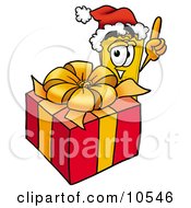Yellow Admission Ticket Mascot Cartoon Character Standing By A Christmas Present