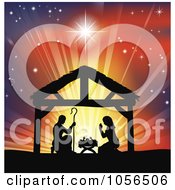 Silhouetted Christian Christmas Nativity Scene Against A Colorful Shining Sky