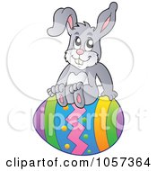 Royalty Free Vector Clip Art Illustration Of An Easter Bunny Sitting On An Egg