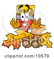 Paint Brush Mascot Cartoon Character With Autumn Leaves And Acorns In The Fall