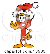 Clipart Picture Of A Paint Brush Mascot Cartoon Character Wearing A Santa Hat And Waving