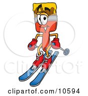 Clipart Picture Of A Paint Brush Mascot Cartoon Character Skiing Downhill