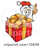 Paper Mascot Cartoon Character Standing By A Christmas Present