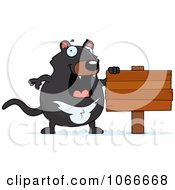Clipart Pudgy Tazmanian Devil With A Wood Sign Royalty Free Vector Illustration by Cory Thoman
