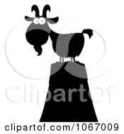 Clipart Silhouetted Mountain Goat With White Eyes Royalty Free Vector Illustration