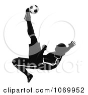 Clipart Silhouetted Soccer Player Catching Air To Kick A Ball Royalty Free Vector Illustration